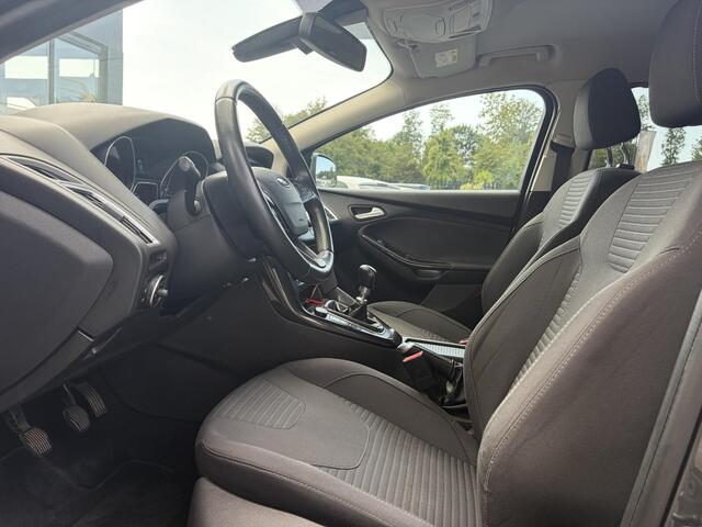Ford FOCUS Wagon 1.0 Titanium 2e Eigenaar,Navi,Trekhaak,125pk,Clima,Cruise,Pdc V+A,6 Bak,Lm velgen,N.A.P,Apk tot 07-2027