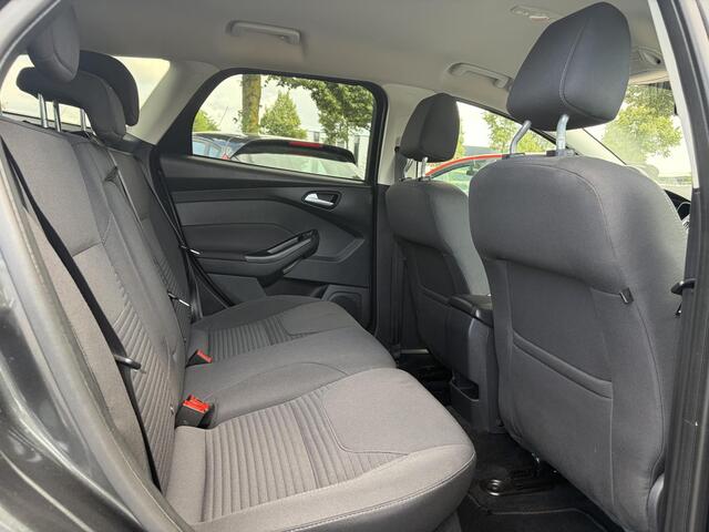 Ford FOCUS Wagon 1.0 Titanium 2e Eigenaar,Navi,Trekhaak,125pk,Clima,Cruise,Pdc V+A,6 Bak,Lm velgen,N.A.P,Apk tot 07-2027