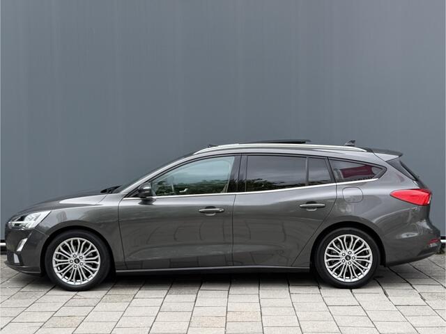 Ford FOCUS Wagon BWJ 2019 | 1.0T 126PK Titanium Bus AUTOMAAT | TREKHAAK | PANO DAK | LEER | LED | NAVI | CLIMA | STOEL&STUUR VERW | PDC | DONKER GLASS |