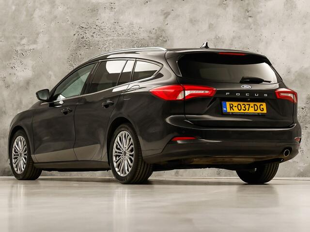 Ford FOCUS Wagon 1.0 EcoBoost Titanium Sport (APPLE CARPLAY, GROOT NAVI, STUUR/STOELVERWARMING, CAMERA, SPORTSTOELEN, GETINT GLAS, ADAPTIVE CRUISE, NIEUWSTAAT)