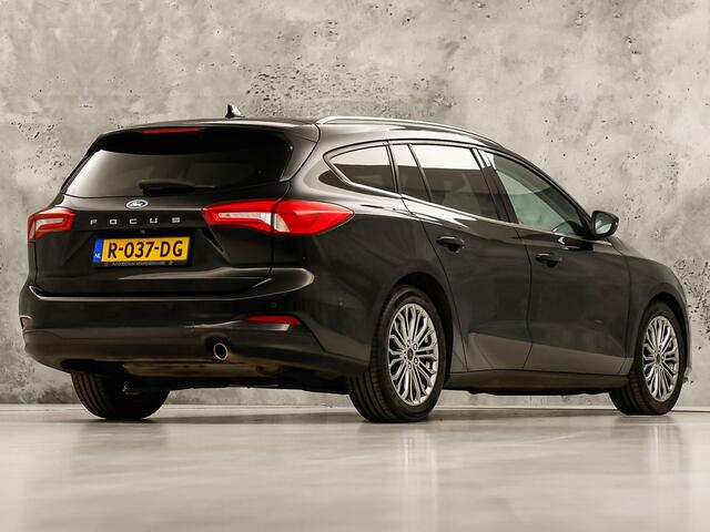Ford FOCUS Wagon 1.0 EcoBoost Titanium Sport (APPLE CARPLAY, GROOT NAVI, STUUR/STOELVERWARMING, CAMERA, SPORTSTOELEN, GETINT GLAS, ADAPTIVE CRUISE, NIEUWSTAAT)