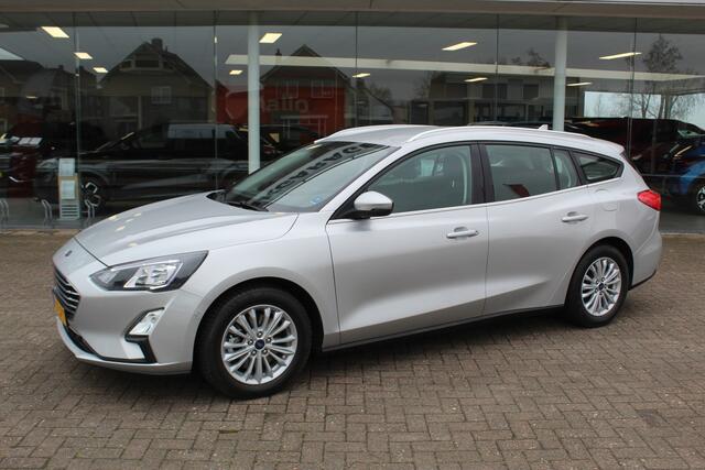 Ford FOCUS Wagon 1.0-125pk EcoBoost Mild-hybrid Titanium. Mooie, ruime, luxe en comfortabele Ford Focus wagon. Volautm. airco dual, camera, easy entry/easy go, stoel-, stuur- en voorraamverw., cruise control, Isofix, side- en lane assist, parkeersensoren v+a, LM wielen etc.