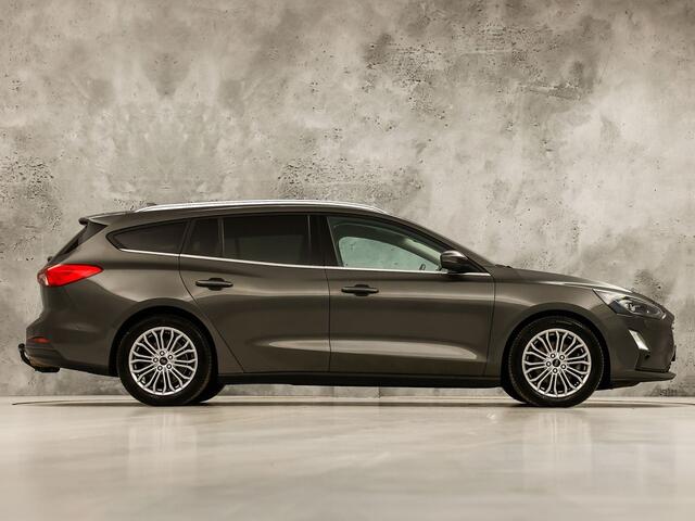 Ford FOCUS Wagon 1.0 EcoBoost Titanium Sport (APPLE CARPLAY, GROOT NAVI, STUUR/STOELVERWARMING, CAMERA, SPORTSTOELEN, GETINT GLAS, ADAPTIVE CRUISE, NIEUWSTAAT)
