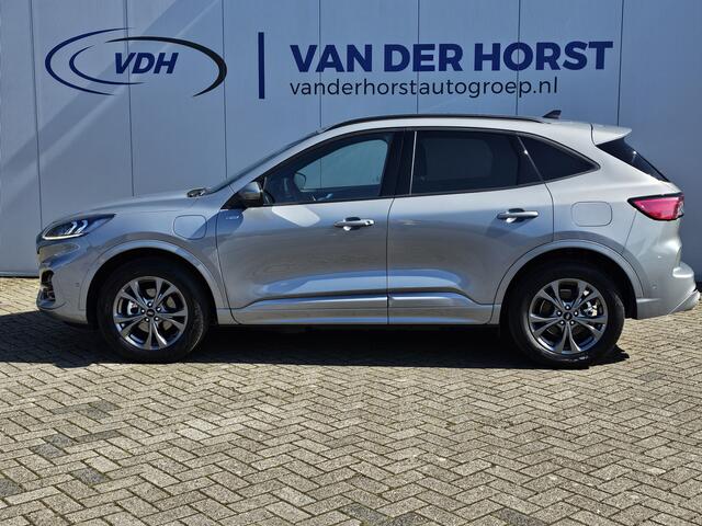 Ford KUGA 2.5-225pk PHEV ST-Line X. Fabr. garantie t/m 24-03-2028 ! Slechts 16.000km ! Autm. airco dual, side- en lane assist, camera v+a, parkeersensoren, elektr. achterklep, stoel-, stuur- en voorraamverw., metallic lak, head-up displ., B&O soundsyst., adapt. cru