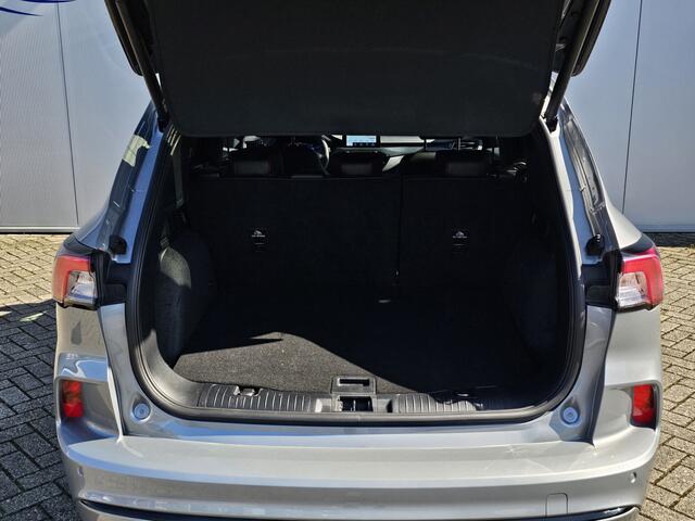 Ford KUGA 2.5-225pk PHEV ST-Line X. Fabr. garantie t/m 24-03-2028 ! Slechts 16.000km ! Autm. airco dual, side- en lane assist, camera v+a, parkeersensoren, elektr. achterklep, stoel-, stuur- en voorraamverw., metallic lak, head-up displ., B&O soundsyst., adapt. cru