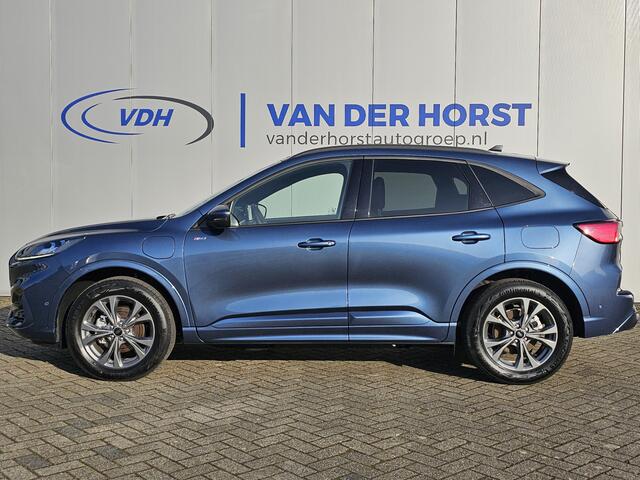 Ford KUGA 2.5-225pk PHEV ST-Line X Plug-in Hybrid. Garantie t/m 04-02-2028 ! Slechts 5.500km ! Volautm. airco dual, elektr. achterklep, LM wielen, stuur-, stoel- en voorraamverwarming, camera v+a, side- en lane assist, adaptieve cruise cntrl, metallic lak, etc.