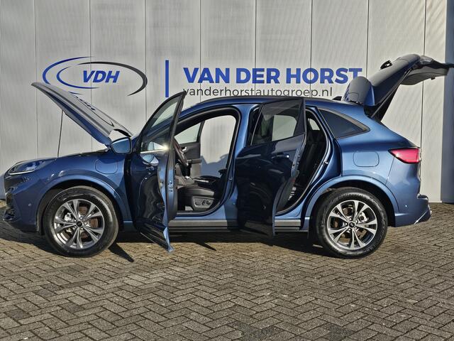 Ford KUGA 2.5-225pk PHEV ST-Line X Plug-in Hybrid. Garantie t/m 04-02-2028 ! Slechts 5.500km ! Volautm. airco dual, elektr. achterklep, LM wielen, stuur-, stoel- en voorraamverwarming, camera v+a, side- en lane assist, adaptieve cruise cntrl, metallic lak, etc.