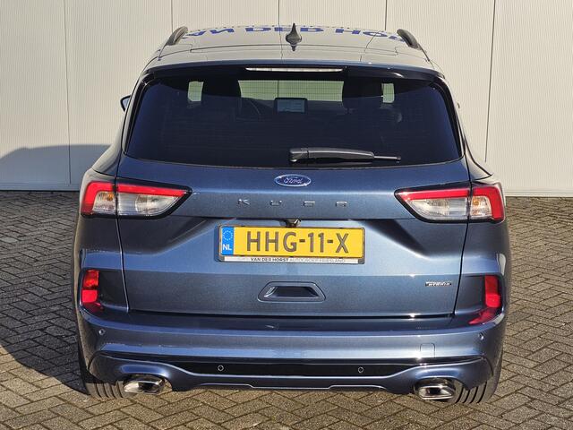 Ford KUGA 2.5-225pk PHEV ST-Line X Plug-in Hybrid. Garantie t/m 04-02-2028 ! Slechts 5.500km ! Volautm. airco dual, elektr. achterklep, LM wielen, stuur-, stoel- en voorraamverwarming, camera v+a, side- en lane assist, adaptieve cruise cntrl, metallic lak, etc.