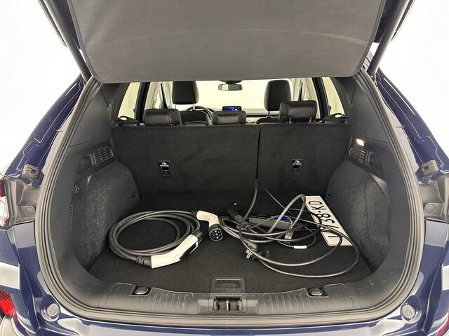 Ford KUGA 2.5 PHEV Titanium X (INCL-BTW) *1/2LEATHER | FULL-LED | DIGI-COCKPIT | ADAPTIVE-CRUISE | BLINDSPOT | PARK-PILOT | CAMERA | NAVI-FULLMAP | HEATED-SEATS | COMFORT-SEATS | ECC | CARPLAY | PDC | DAB | LANE-ASSIST |