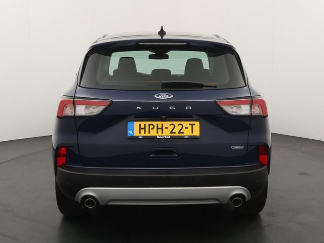 Ford KUGA 2.5 PHEV 225pk Titanium | Stoelverwarming | Camera | Panorama dak | Keyless | Cruise | All-Season banden|
