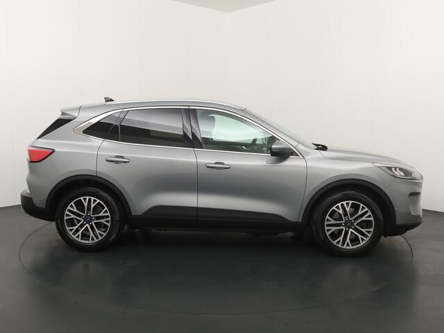 Ford KUGA 2.5 PHEV 225 pk Titanium | Trekhaak | Winter Pack | Adapt. cruise | Camera's | 18" | Navi | Clima