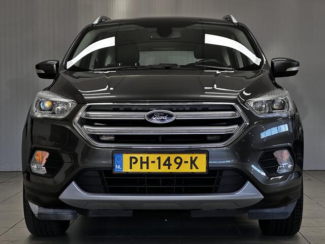 Ford KUGA 1.5 EcoBoost Titanium /Trekhaak! /Camera /Android auto /Voorruitverw. /Navi /Climat /Cruise /Elek. pakket /Bluetooth /Regensensor /17"LMV /PDC /Mistlampen /LED Dagrijverl.