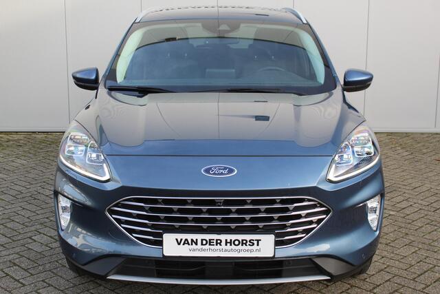 Ford KUGA 2.5-225pk PHEV Titanium X. Hybride rijden voor een reële prijs ! Stoel-, stuur- en voorraamverw., Adapt. cruise control, Side- en lane assist, B&O soundsyst., Trekhaak afneemb. kogel, Climate control, Navigatie,, Bluetooth, Elektr. achterkle