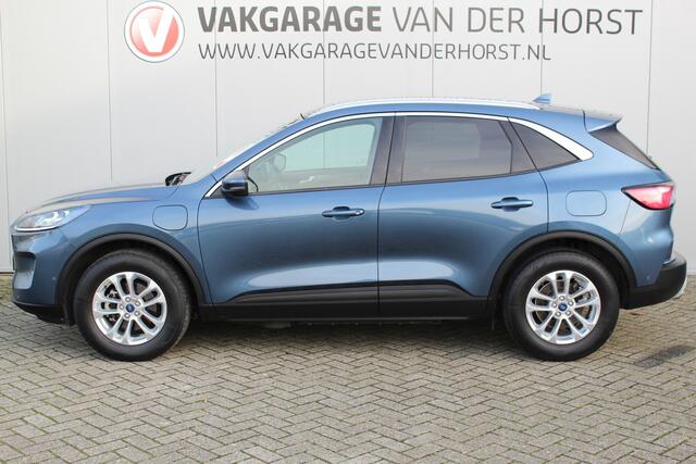 Ford KUGA 2.5-225pk PHEV Titanium X. Hybride rijden voor een reële prijs ! Stoel-, stuur- en voorraamverw., Adapt. cruise control, Side- en lane assist, B&O soundsyst., Trekhaak afneemb. kogel, Climate control, Navigatie,, Bluetooth, Elektr. achterkle