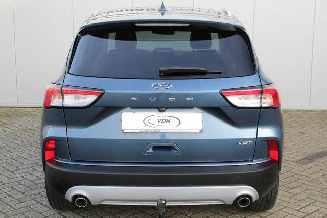 Ford KUGA 2.5-225pk PHEV Titanium X. Hybride rijden voor een reële prijs ! Stoel-, stuur- en voorraamverw., Adapt. cruise control, Side- en lane assist, B&O soundsyst., Trekhaak afneemb. kogel, Climate control, Navigatie,, Bluetooth, Elektr. achterkle