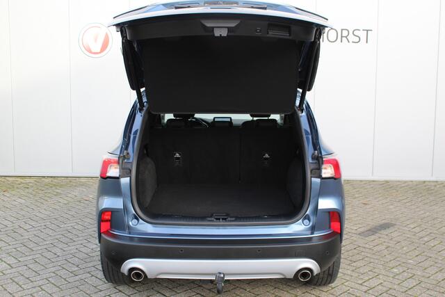 Ford KUGA 2.5-225pk PHEV Titanium X. Hybride rijden voor een reële prijs ! Stoel-, stuur- en voorraamverw., Adapt. cruise control, Side- en lane assist, B&O soundsyst., Trekhaak afneemb. kogel, Climate control, Navigatie,, Bluetooth, Elektr. achterkle