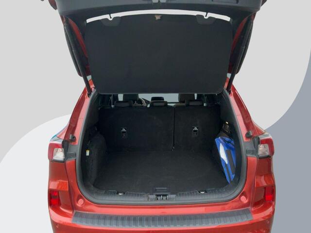 Ford KUGA 2.5 PHEV ST-Line X | Wegklapbare trekhaak | Panoramadak | Speciale kleur "Sedona Orange" | Winter Pack | Rode remklauwen