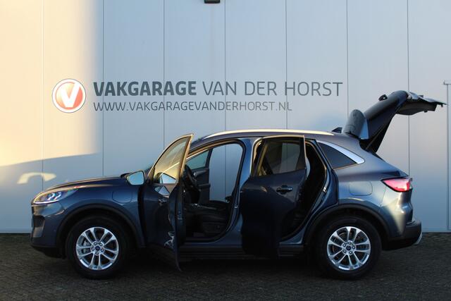 Ford KUGA 2.5-225pk PHEV Titanium X. Luxe hybride rijden voor een reëel bedrag ! Autm. airco, stoel-, stuur- en voorraamverw., elektr. panoramadak, navigatie, telefoonvoorb., camera v+a, elektr. trekhaak, elektr. achterklep, adaptieve cruise cntrl etc.