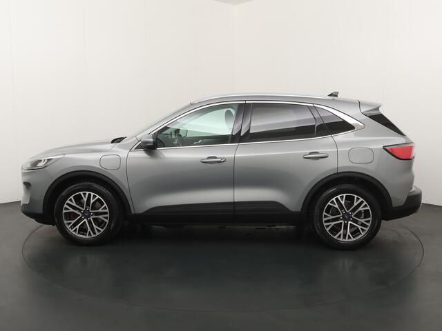 Ford KUGA 2.5 PHEV 225 pk Titanium | Trekhaak | Winter Pack | Adapt. cruise | Camera's | 18" | Navi | Clima