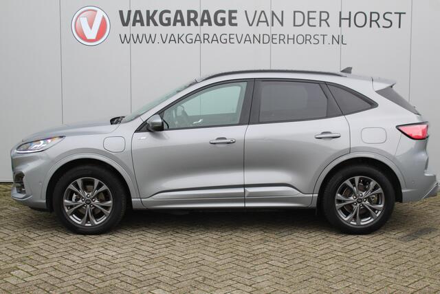 Ford KUGA 2.5-225pk PHEV ST-Line X. Hybride rijden voor een reëel bedrag ! Autm. airco dual, stuur-, stoel-, achterbank- en voorraamverw., keyless entry/keyless go, privacy glass, camera v+a, side- en lane assist, adaptieve cruise cntrl, trekhaak, elektr. achterkle