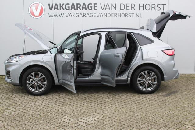 Ford KUGA 2.5-225pk PHEV ST-Line X. Hybride rijden voor een reëel bedrag ! Autm. airco dual, stuur-, stoel-, achterbank- en voorraamverw., keyless entry/keyless go, privacy glass, camera v+a, side- en lane assist, adaptieve cruise cntrl, trekhaak, elektr. achterkle