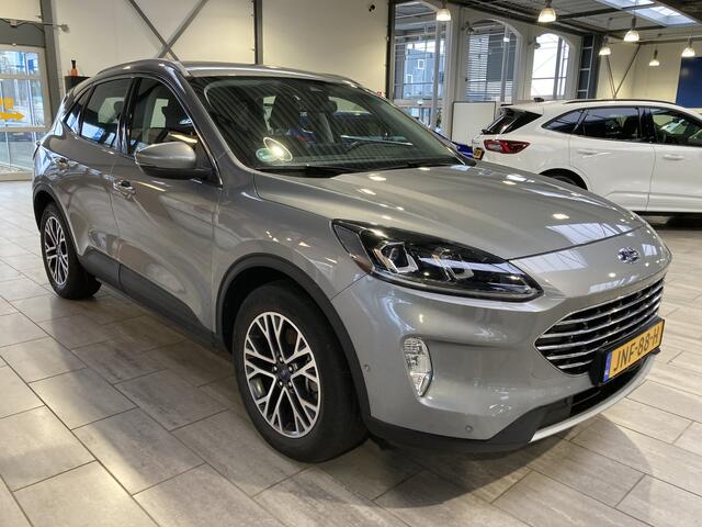 Ford KUGA 2.5 PHEV Titanium | 100% Dealer onderhouden | Winter Pack | Adapt. Cruise | HUD | Camera |