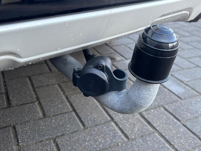 Ford KUGA 2.5i PHEV Aut. 165kW ST-Line X Automaat / Schuif/kantel dak / Elektrische trekhaak 1.500 kg / Winterpack / Adaptive Cruise / EAER 56 km / Stuur-, stoel-, achterbank- en voorruitverwarming / Bang & Olufsen audio / Navi / Apple Carplay Android /