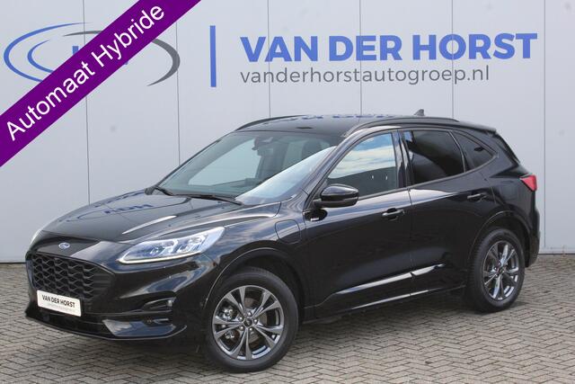 Ford KUGA 2.5-225pk Plug-in Hybrid ST-Line X. Hybride rijden voor een reële prijs ! Adaptive Cruise Control, Stoel-, stuur- en voorraamverwarming, Climate Control, Metallic lak, Camera v+a, Elektr. achterklep, Side- en lane assist etc.