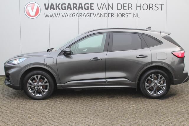 Ford KUGA 2.5-225pk Plug-in Hybrid ST-Line X. Hybride rijden voor een reële prijs ! Adaptive Cruise Control, Stoel-, achterbank, stuur- en voorraamverwarming, autm. airco dual, camera v+a, elektr. achterklep, side- en lane assist etc.