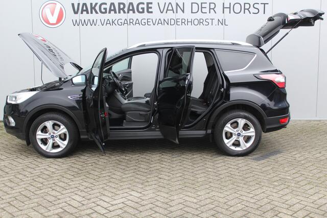 Ford KUGA 1.5-150pk EcoBoost Titanium. Nette Ford Kuga met een trekgewicht van maar liefst 2.000kg ! Autm. airco, stoel-, stuur- en voorraamverw., camera, parkeersensoren achter, navigatie, telefoonvoorb., 17"LM wielen+all season banden, trekhaak, adapt. cruise cn
