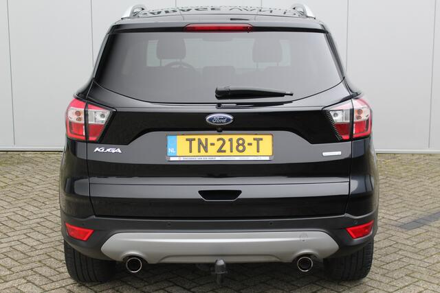 Ford KUGA 1.5-150pk EcoBoost Titanium. Nette Ford Kuga met een trekgewicht van maar liefst 2.000kg ! Autm. airco, stoel-, stuur- en voorraamverw., camera, parkeersensoren achter, navigatie, telefoonvoorb., 17"LM wielen+all season banden, trekhaak, adapt. cruise cn