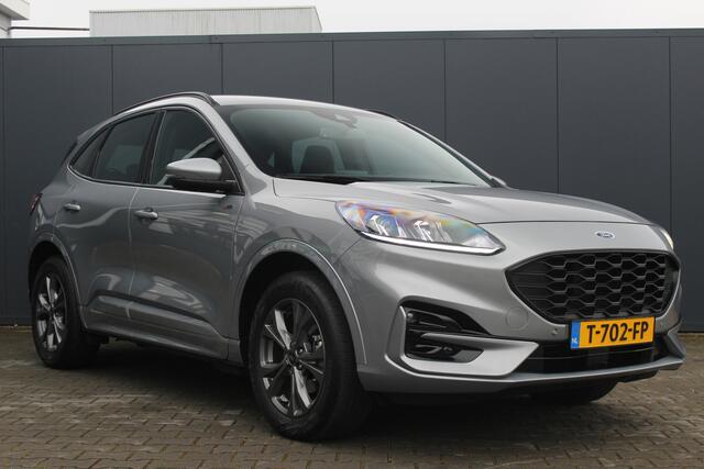 Ford KUGA 2.5 PHEV ST-Line | Incl. 12 maanden garantie | Virtual cockpit | DAB+ | Navigatie | Achteruitrijcamera | Apple carplay/ Android auto | Zwart hemel | 18" velgen | Parkeersensoren voor en achter | Keyless entry & go |
