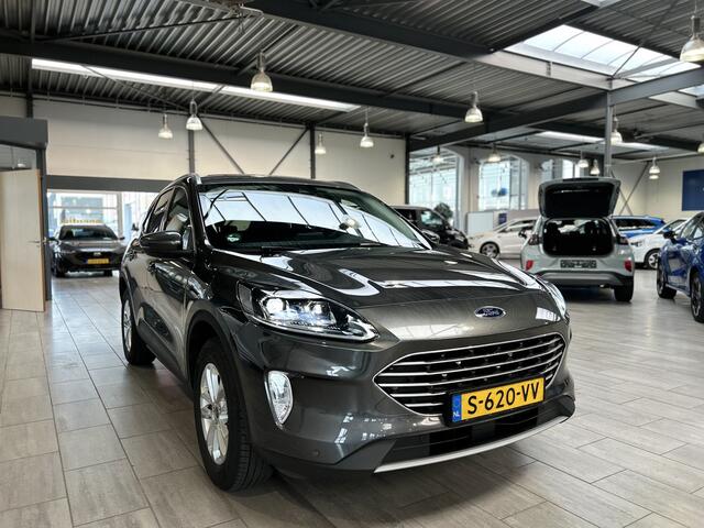 Ford KUGA 2.5 PHEV 225 pk Titanium X | Trekhaak | Camera | B&O | El. a. klep | Half Leer | Winter Pack | Adapt. Led | 4 seiz. banden |