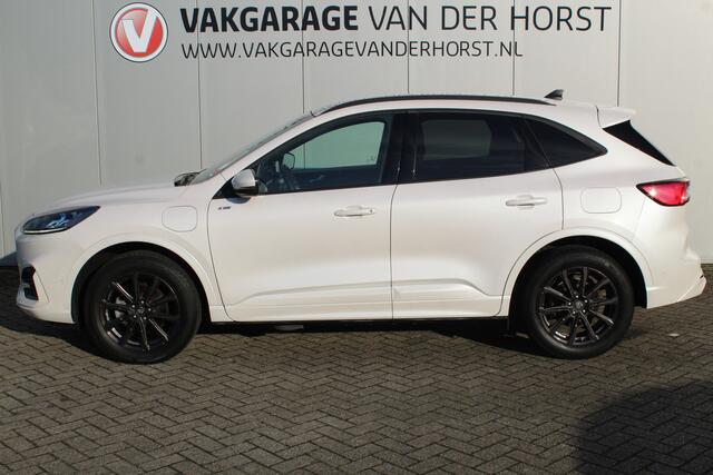 Ford KUGA 2.5-225pk Plug-in Hybrid ST-Line X. Hybride rijden voor een reële prijs ! Autm. airco dual, side- en lane assist, adaptieve cruise cntrl, camera v+a, stoel-, stuur- en voorraamverw., elektr. achterklep, metallic lak, navigatie, telefoonvoorb. etc.