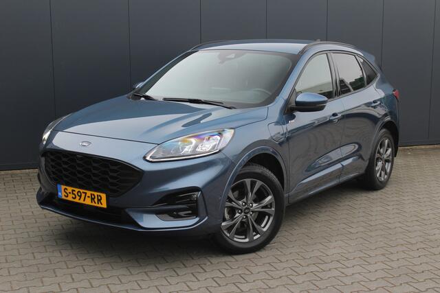 Ford KUGA 2.5 PHEV ST-Line X | Incl. 12 maanden garantie | Trekhaak | B&O audio | Achteruitrijcamera | Camera voor | Parkeersensoren | Cruise control | DAB | Elektrische kofferklep | Lichtmetalen velgen | Climate control | Bluetooth | Airco