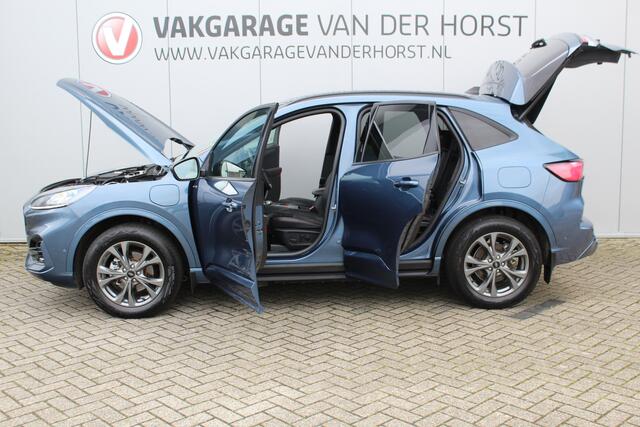 Ford KUGA 2.5-225 pk PHEV ST-Line X. Hybride rijden voor een reëel bedrag ! Slechts 31.500km ! Stoel-, stuur-, achterbank en voorraamverw., B&O soundsyst., Adaptieve Cruise Control, Climate Control dual, Camera v+a, Navigatie, Telefoonvoorb., Side- en lane assist e