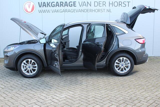 Ford KUGA 2.5-225 pk PHEV Titanium X Plug-In Hybrid-Automaat. Hybride rijden voor een reële prijs ! Adapt. Cruise Cntrl, Climate Cntrl, Navigatie, Side- en Lane assist, Telefoonvoorb., Keyless entry/keyless go, Stoel- en voorraamverw., Camera v+a, All season banden