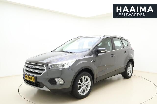 Ford KUGA 1.5 EcoBoost Titanium | Trekhaak | Achteruitrijcamera | Airco | Navigatie | Elektrische achterklep | Cruise control | Start/Stop bediening | Climate control | Parkeersensoren | Lederen/stof interieur | Stuurbediening
