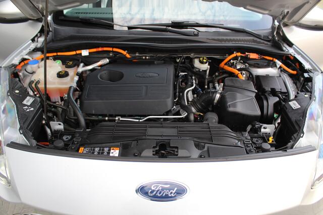 Ford KUGA 2.5-225pk PHEV Titanium. Hybride rijden voor een reëel bedrag ! Autm. airco dual, stoel-, stuur-, achterbank- en voorraamverw., navigatie, telefoonvoorb., trekhaak, metallic lak, LM wielen+ AllSeason banden etc.