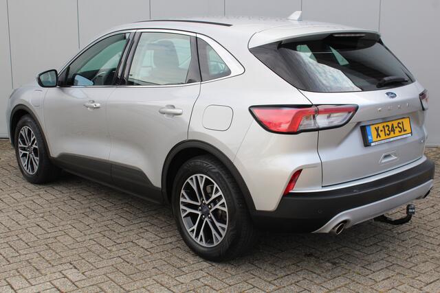 Ford KUGA 2.5-225pk PHEV Titanium. Hybride rijden voor een reëel bedrag ! Autm. airco dual, stoel-, stuur-, achterbank- en voorraamverw., navigatie, telefoonvoorb., trekhaak, metallic lak, LM wielen+ AllSeason banden etc.