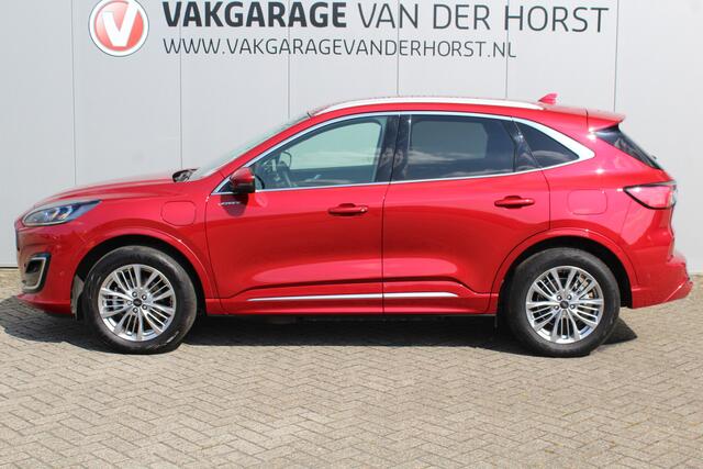 Ford KUGA 2.5-225pk PHEV 'Vignale'. Zeer luxe hybride rijden voor een reële prijs ! Slechts 33.000km ! Autm.airco dual, stuur-, stoel-, achterbank- en voorraamverw., LED verl., lederen interieur, B&O soundsyst., lane- en side assist etc.