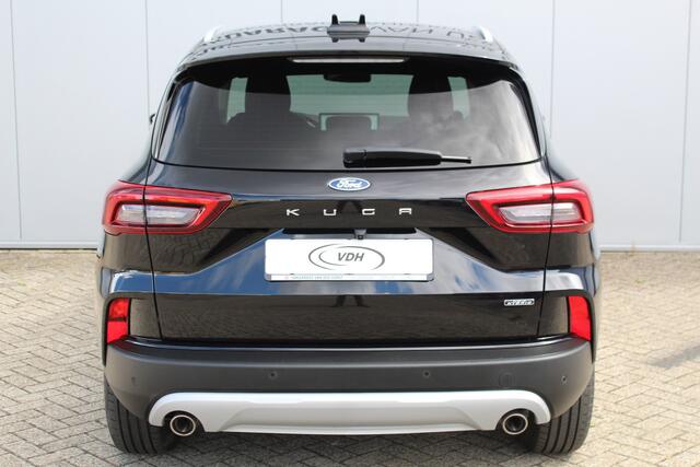 Ford KUGA 2.5-243pk PHEV Titanium. Juli 2025, slechts 16.750km ! Autm. airco dual, navigatie, telefoonvoorb., camera, stoel-, stuur, voorraam- en achterbank verw., elektr. trekhaak, lane assist, LED verl., keyless entry/keyless start etc.