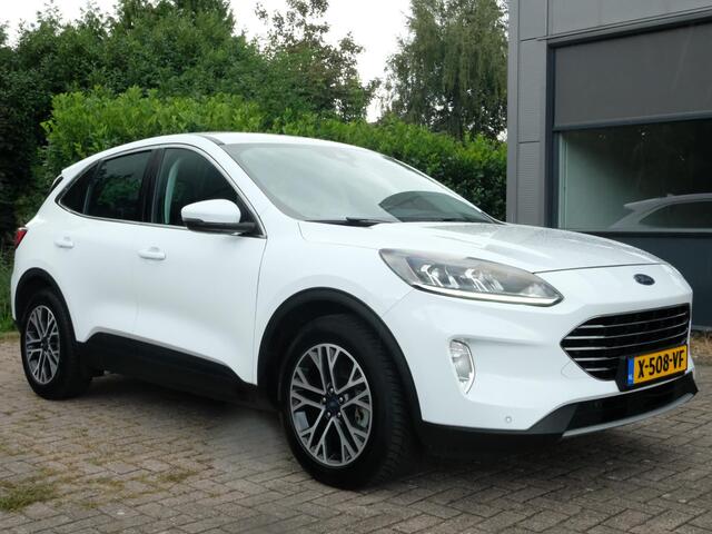 Ford KUGA 2.5 PHEV Titanium 224 PK | Winterpack | Stoelverwarming | Navigatie | Parkeersensoren | CarPlay | Climate Controle |