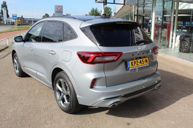 Ford KUGA 2.5-243pk PHEV ST-Line X , Trekgewicht 2100kg Febr. 2026, slechts 12.000km ! Autm. airco dual, elektr. panodak, elektr. trekhaak, elektr. achterklep, leer/alcantara, klep, LED verl., navigatie, telefoonvoorb., stoel-, stuur-, voorraam- en achterbankverw., side- en lan