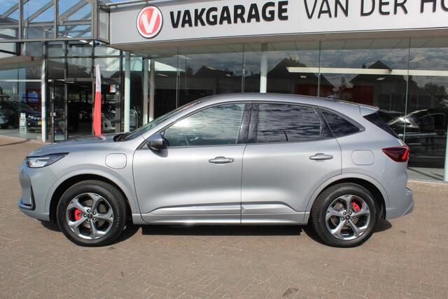 Ford KUGA 2.5-243pk PHEV ST-Line X , Trekgewicht 2100kg Febr. 2026, slechts 12.000km ! Autm. airco dual, elektr. panodak, elektr. trekhaak, elektr. achterklep, leer/alcantara, klep, LED verl., navigatie, telefoonvoorb., stoel-, stuur-, voorraam- en achterbankverw., side- en lan