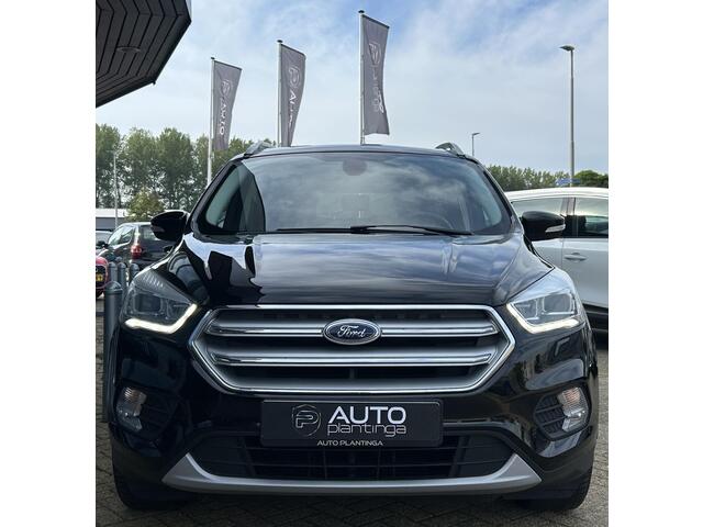 Ford KUGA 1.5 EcoBoost Titanium 150PK | ZEER NETTE STAAT | Achteruitrijcamera | SONY Audio | Elektrische Achterklep | Parkeersensoren | Navigatie | Stoelverwarming | Stuurverwarming | Voorruitverwarming | Climate Control | Cruise Control | 2 Sleutels | APK tot 30-08-2027 |