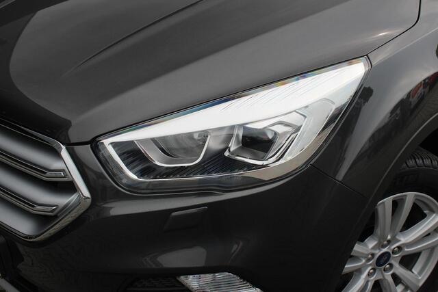 Ford KUGA 1.5 Titanium | Incl. 12 maanden garantie | Voorstoelen verwarmd | Verwarmd stuurwiel | Voorruit verwarming | Bluetooth | DAB | Climate control | Cruise control | Elektrische achterklep | Lichtmetalen velgen