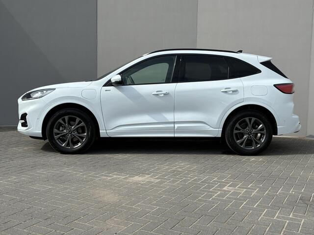Ford KUGA 2.5 PHEV ST-Line X / Dealer onderhouden / Trekgewicht 1.500 kg / Navigatie / Stuur-, stoel- & achterbankverwarming / Parkeer assistent / Camera 360° / Elektrische stoel & klep / 18" LM wielen / Adaptief cruise control / Apple Carplay/Android Auto /