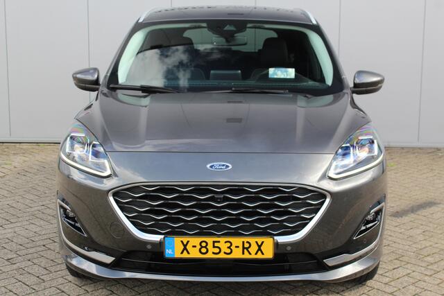 Ford KUGA 2.5-225pk PHEV Vignale. In uiterst nette staat verkerende Ford Kuga in de zeer chique Vignale uitvoering met slechts 23.000km ! Adapt. cruise cntrl, side- en lane assist, trekhaak, head-up display, B&O soundsyst., lederen int., stuur-, stoel-, achterbank- en voorraamverw. etc.