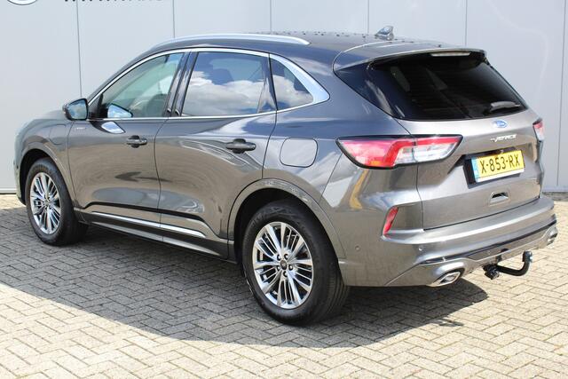 Ford KUGA 2.5-225pk PHEV Vignale. In uiterst nette staat verkerende Ford Kuga in de zeer chique Vignale uitvoering met slechts 23.000km ! Adapt. cruise cntrl, side- en lane assist, trekhaak, head-up display, B&O soundsyst., lederen int., stuur-, stoel-, achterbank- en voorraamverw. etc.